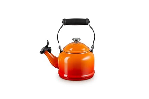 Le Creuset Demi Tea Kettle Flame with sturdy handle and knob.