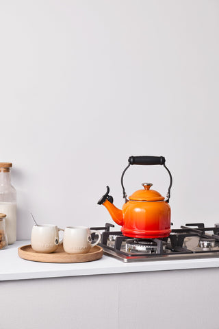 Le Creuset Demi Tea Kettle shows inside min and max markings for accuracy.