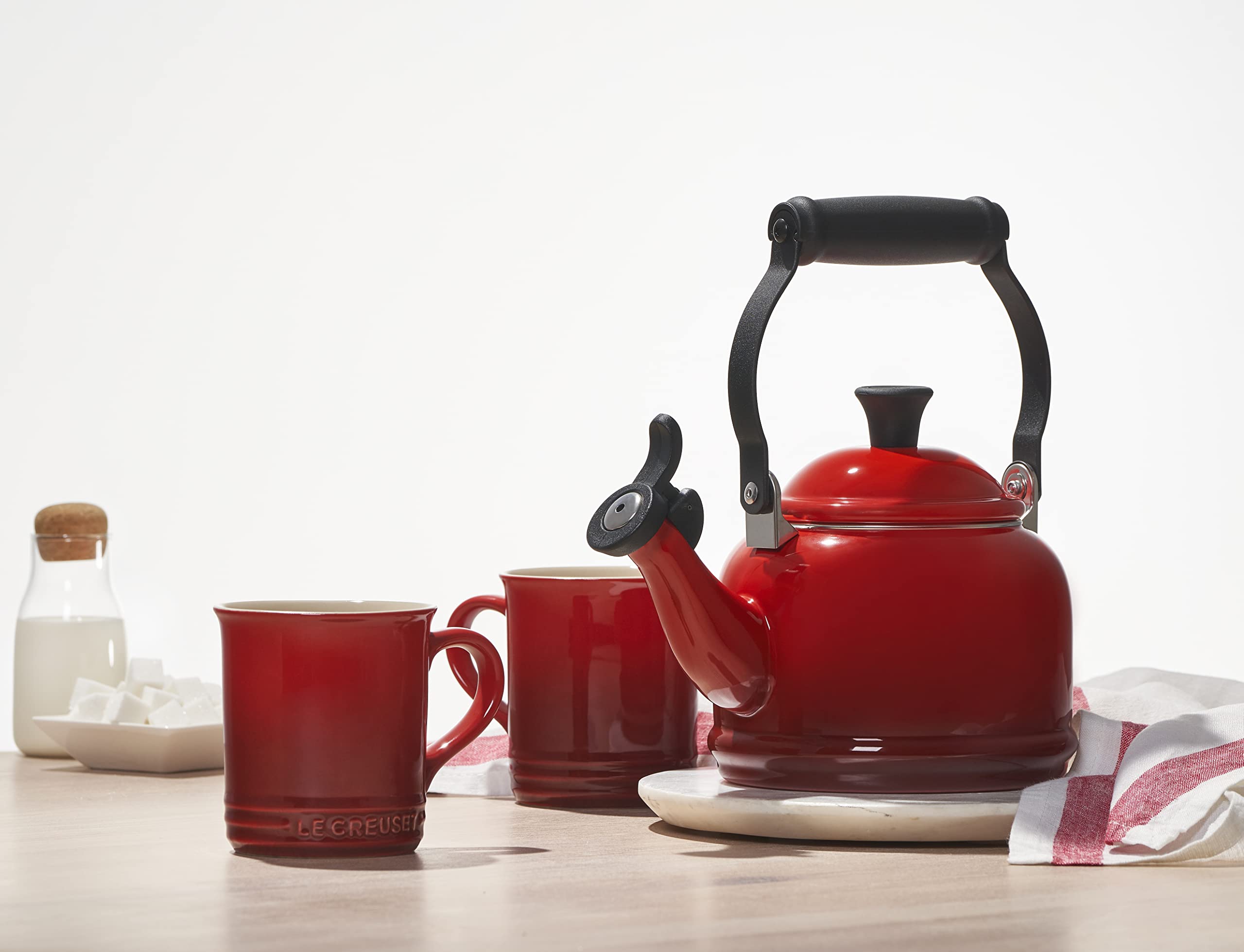 Le Creuset Demi Tea Kettle olive enamel finish resists stains and wear