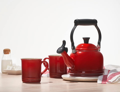 Le Creuset Demi Tea Kettle olive enamel finish resists stains and wear
