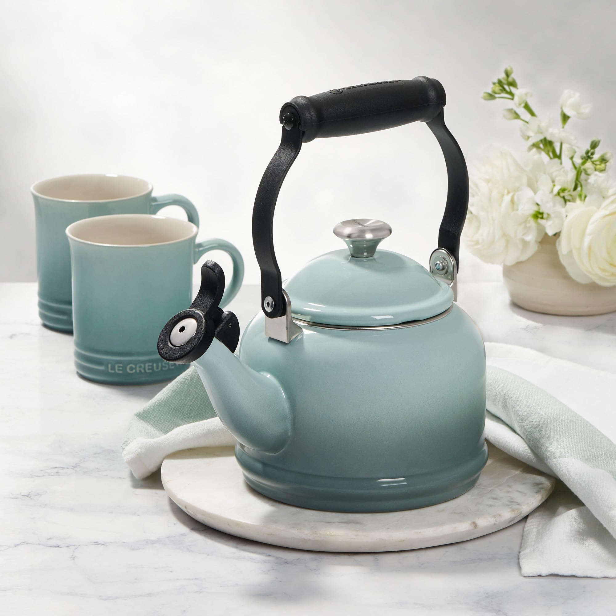 Le Creuset Demi Tea Kettle olive interior markings indicate min and max levels