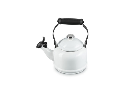 Le Creuset Demi Tea Kettle with whistle signaling boiling readiness