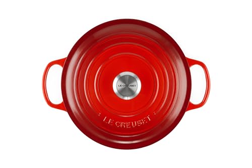 Le Creuset interior enamel in Cerise shows cooking progress clearly.
