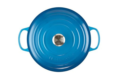 Le Creuset interior enamel shows light color for easy monitoring of cooking progress
