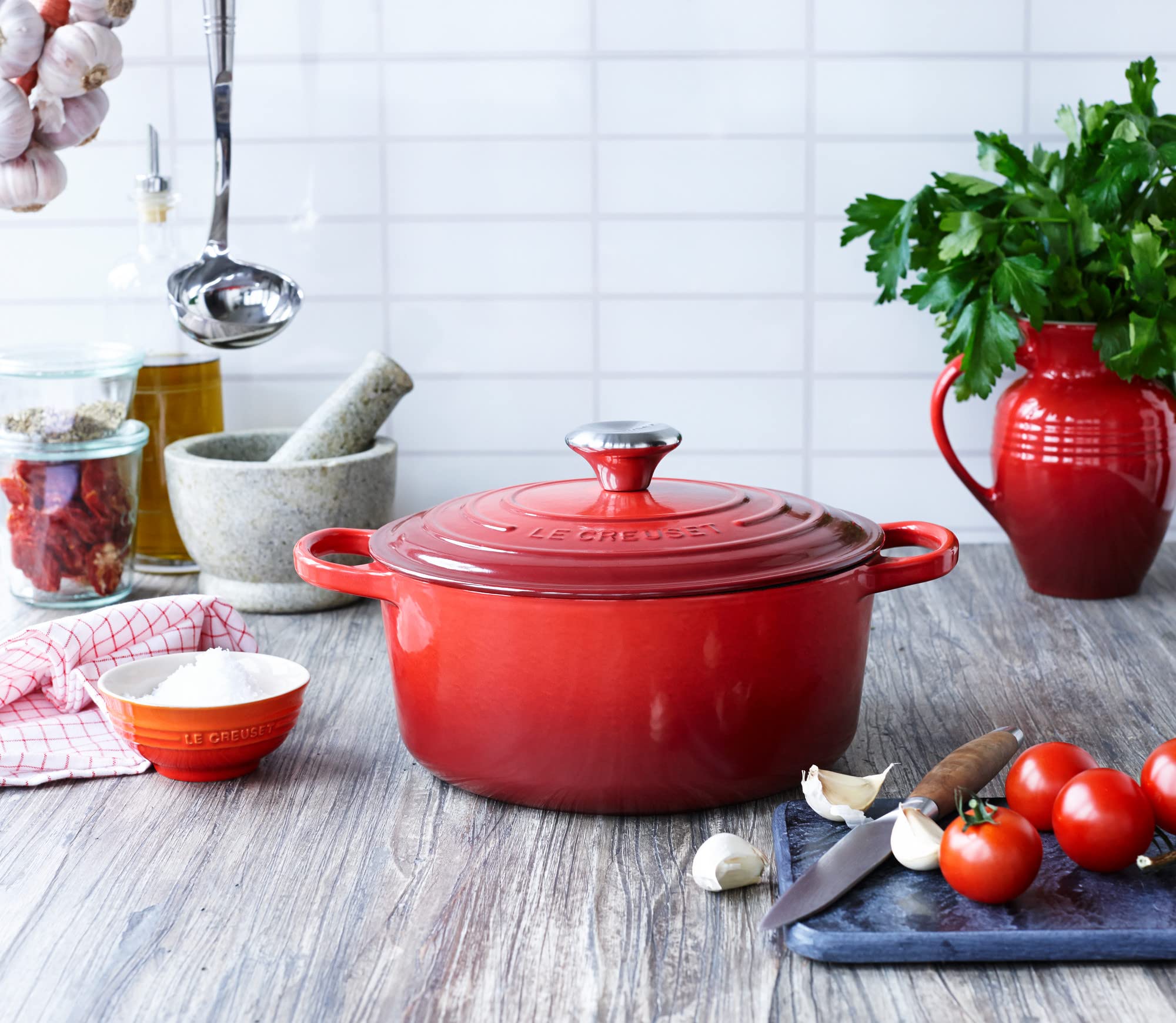 Le Creuset ergonomic handles allow easy lifting during busy cooking sessions.