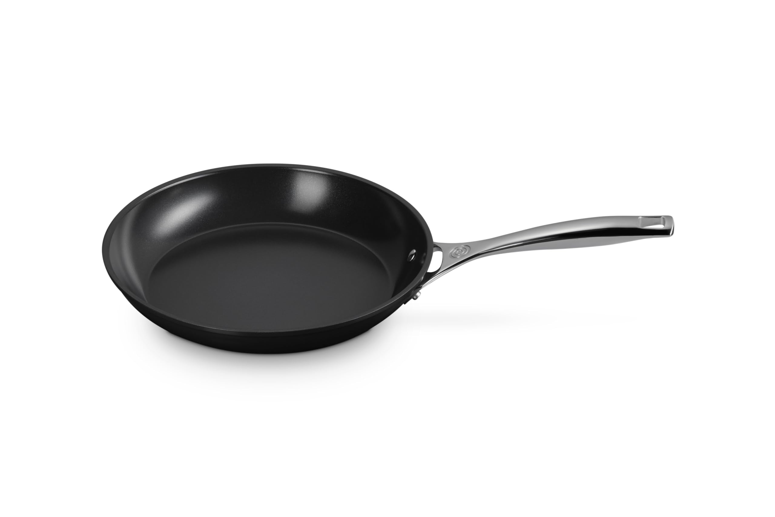 Le Creuset essential non-stick ceramic pan 10in with easy release for quick cleanup.