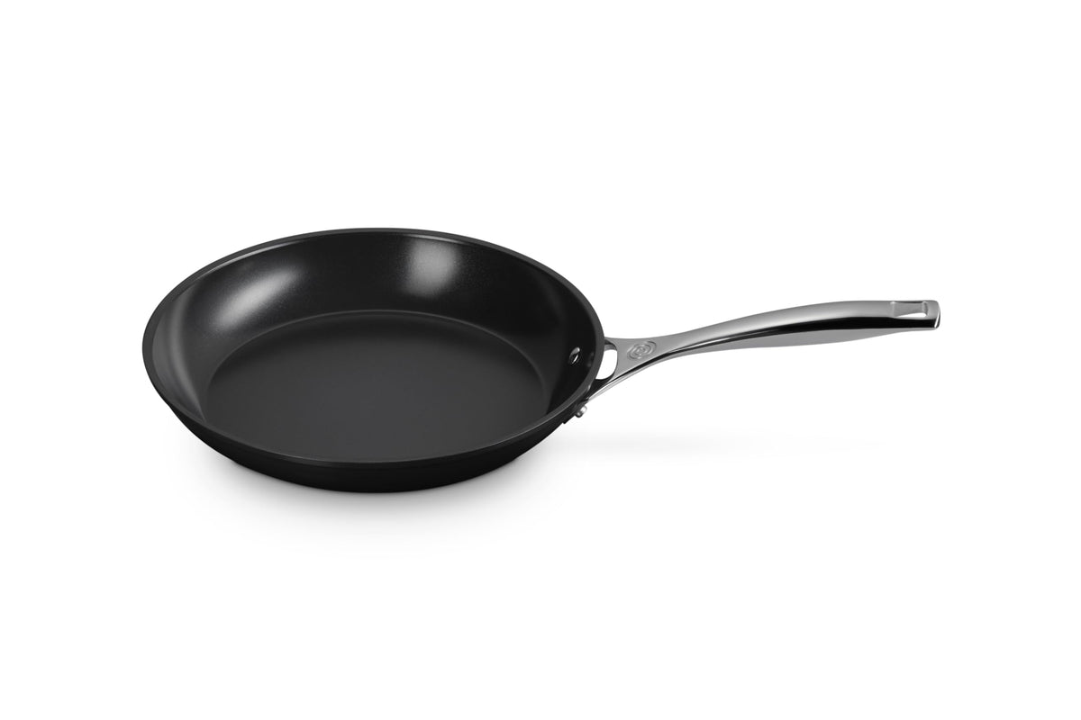 Le Creuset essential non-stick ceramic pan 10in with easy release for quick cleanup.