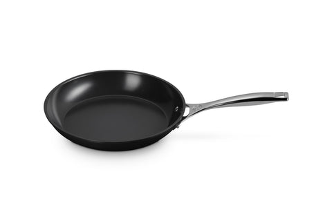 Le Creuset essential non-stick ceramic pan 10in with easy release for quick cleanup.