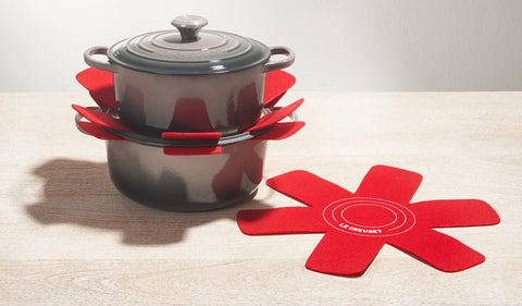 Le Creuset protectors Cerise, care tips for hand wash and air dry after use.