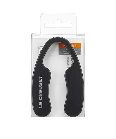 Le Creuset handheld foil cutter in action for effortless bottle prep