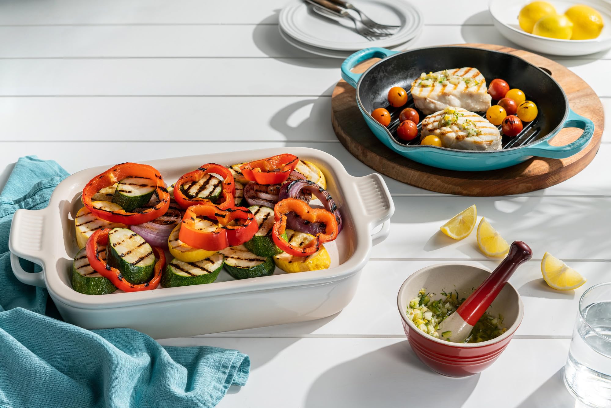 Lid doubles as a stylish serving piece for cheeses and salads.