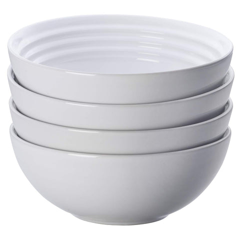 Le Creuset freezer-to-oven-safe dishes support versatile kitchen use.