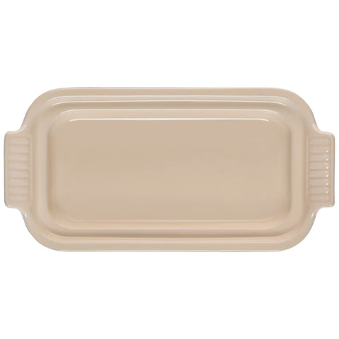Le Creuset Heritage Butter Dish Marseille, side view, nonporous glaze resists stains and scratches.