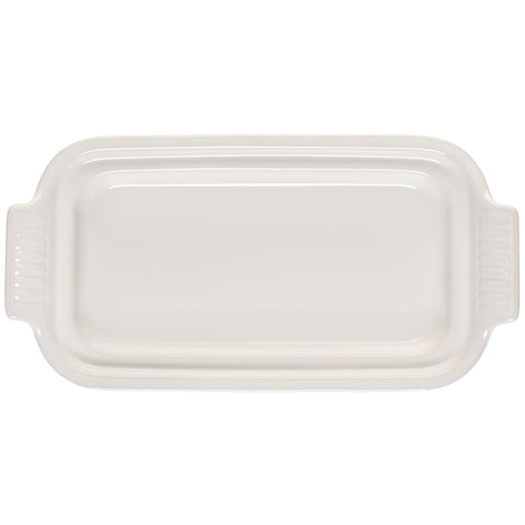 Le Creuset Heritage Butter Dish white in use on table, keeps butter ready for serving.