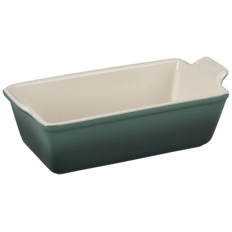 Le Creuset Heritage Loaf Pan Artichaut angle view showing even browning and premium stoneware.