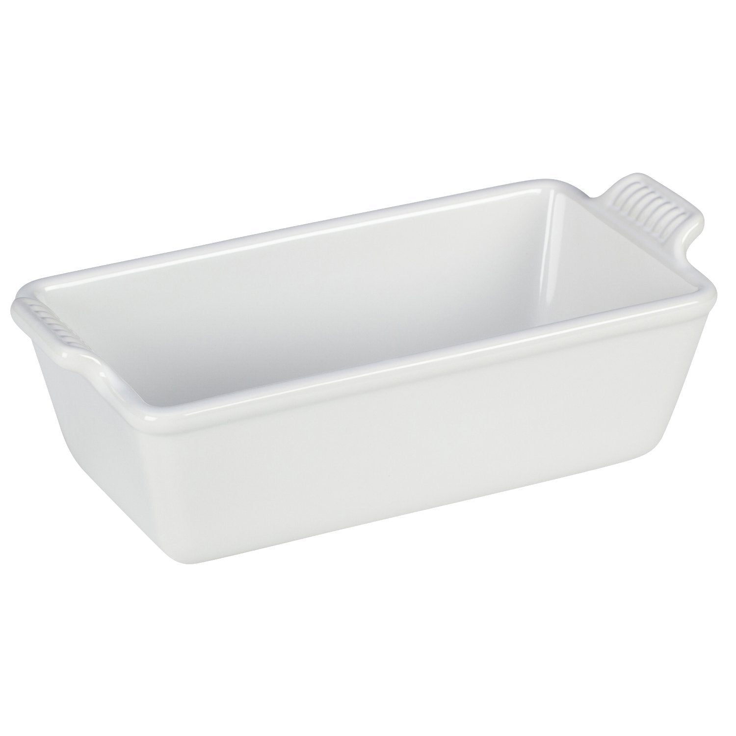 Le Creuset Heritage loaf pan showing even browning and vibrant glaze.
