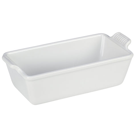 Le Creuset Heritage loaf pan showing even browning and vibrant glaze.