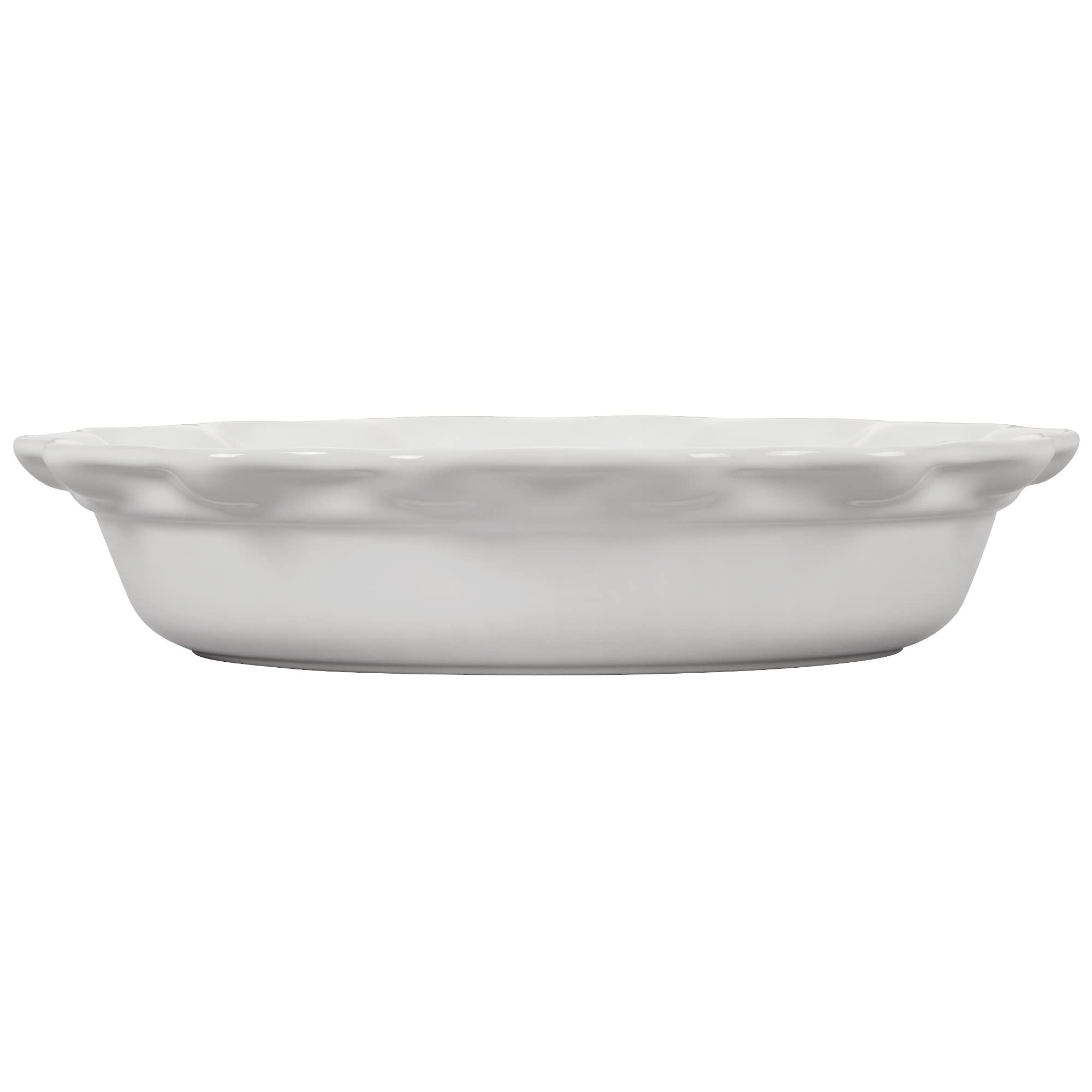 Le Creuset Heritage pie dish white clean-up scene emphasizing quick release and nonstick glaze.
