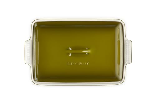 Le Creuset Heritage olive casserole with lid on for moisture and flavor retention.