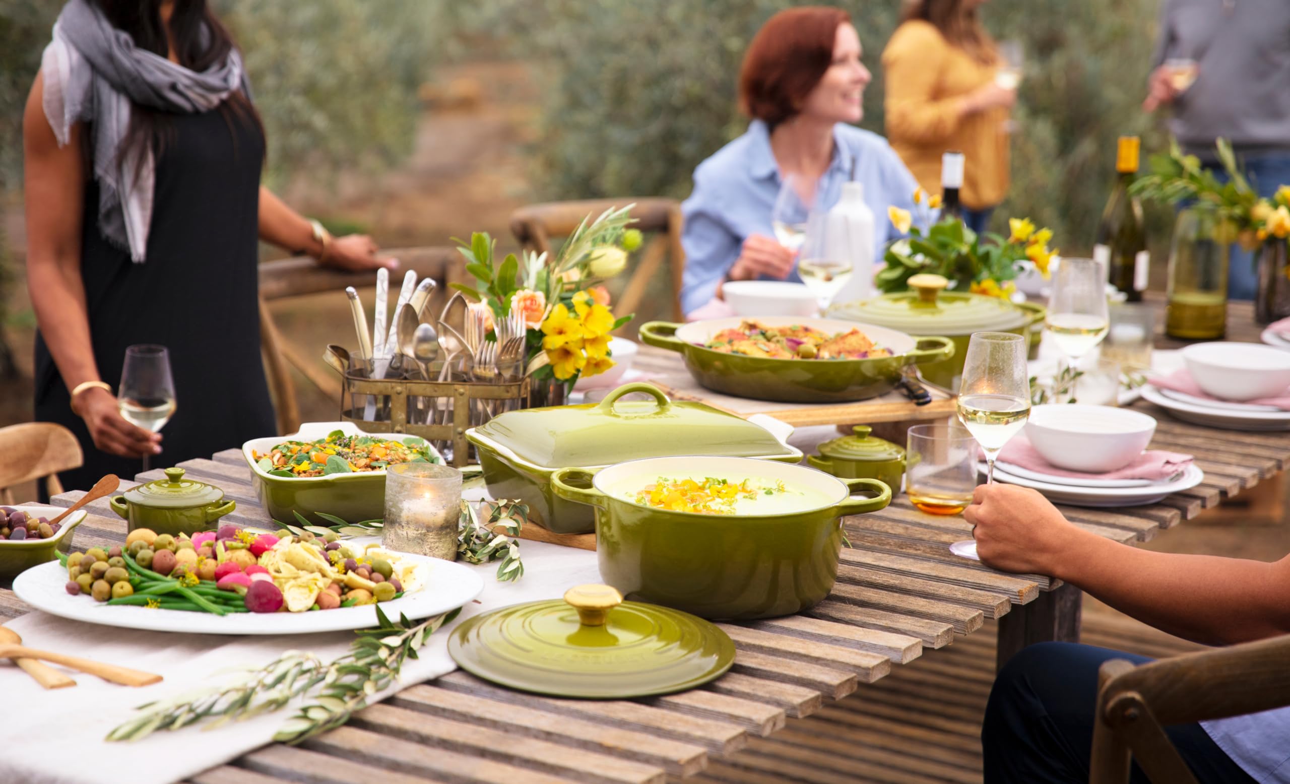 Le Creuset Heritage olive casserole on table enhances presentation and keeps warmth.