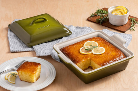 Le Creuset Heritage shallow casserole keeps food warm longer for serving.