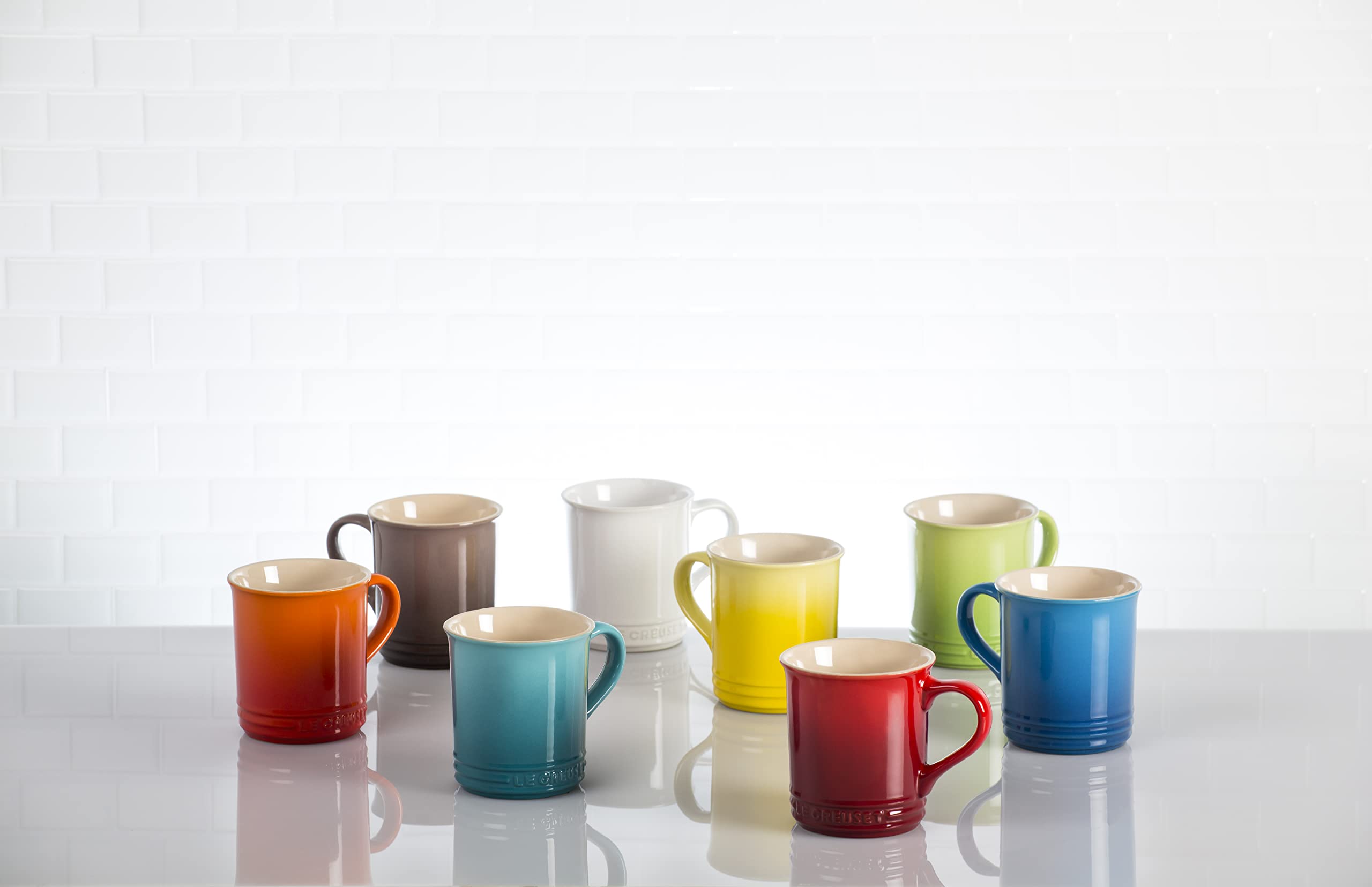Le Creuset high-fired stoneware mug endures daily use with Peche glaze.