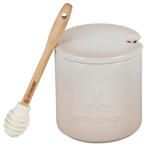 Le Creuset honey pot in Meringue glaze with 14 oz capacity for easy drizzle.
