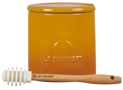 Le Creuset stoneware honey pot with silicone dipper ready for drizzling.