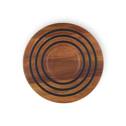 Le Creuset magnetic wooden trivet on acacia wood showing heat protection in kitchen settings