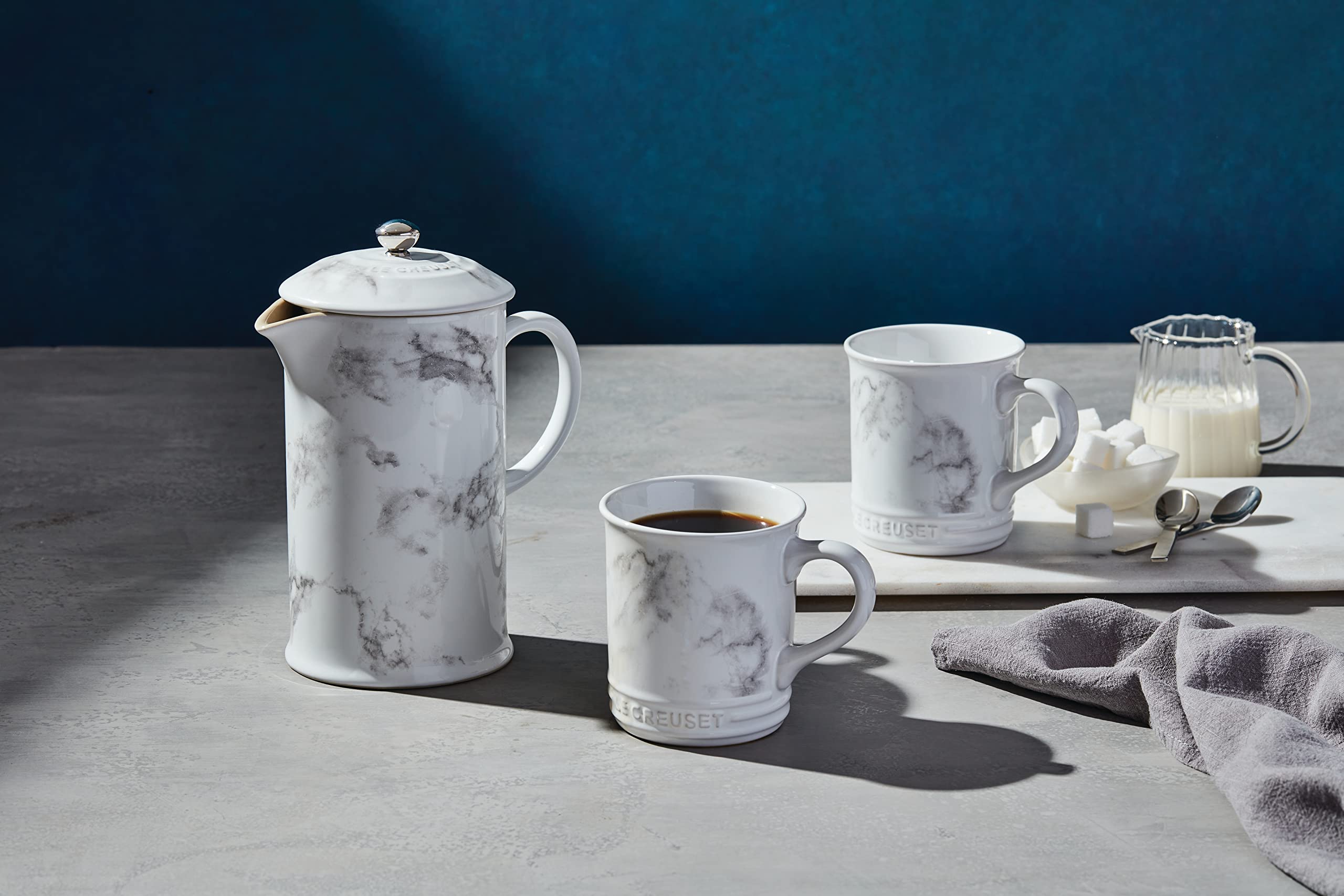 Le Creuset Marble Collection French Press in use with coffee, even infusion promised