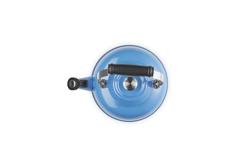 Le Creuset Marseille enamel kettle whistle indicates boiling readiness for safe pouring.