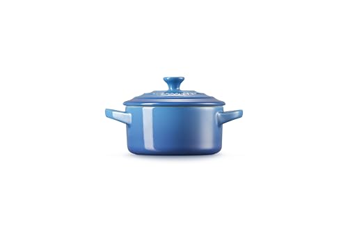 Le Creuset Marseille mini cocotte interior enamel is non-porous and easy to clean.