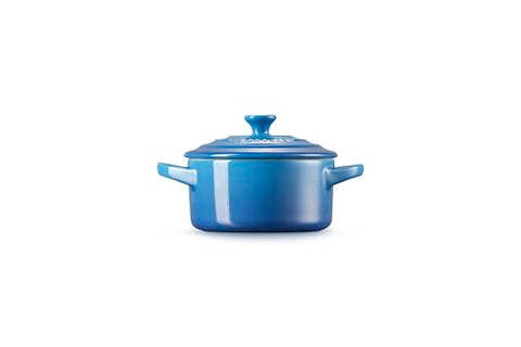 Le Creuset Marseille mini cocotte interior enamel is non-porous and easy to clean.