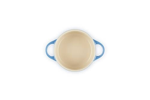 Le Creuset Marseille mini cocotte loop handles provide a secure grip during transport.
