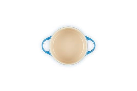 Le Creuset Marseille mini cocotte loop handles provide a secure grip during transport.