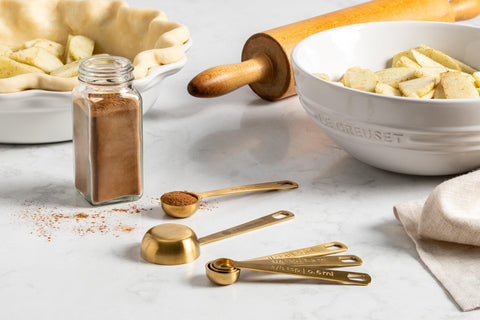 Le Creuset gold measuring spoons 1-tbsp for larger portions.