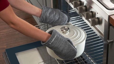 Le Creuset Charbon mitts feature a loop for easy hanging and accessible storage.