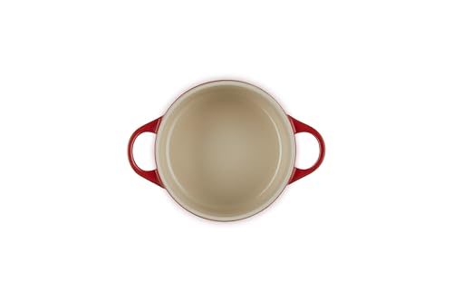 Le Creuset cerise cocotte lid fits securely, trapping moisture for tender results