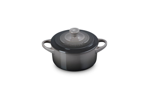 Le Creuset mini round cocotte 14 oz oyster front view, ideal for single portions and elegant plating.
