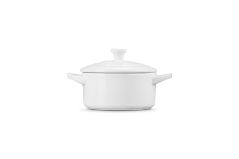 Le Creuset mini round cocotte white interior view, smooth enamel surface.