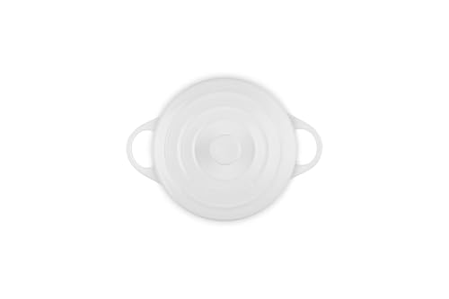Le Creuset mini round cocotte white with loop handles, easy transport.