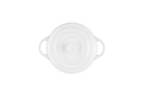 Le Creuset mini round cocotte white close-up glaze highlights browning surface