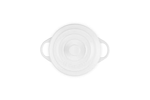 Le Creuset mini round cocotte white close-up glaze highlights browning surface