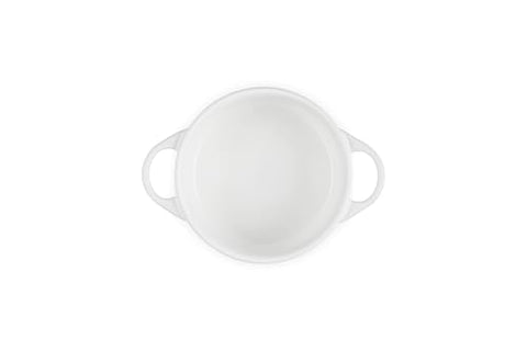Le Creuset mini round cocotte white glaze close-up nonporous surface