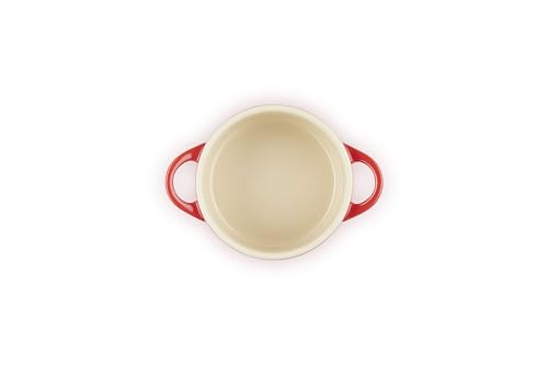 Le Creuset mini round cocotte cerise, oven-ready pot for quick weeknight gratins and desserts.