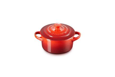Le Creuset mini round cocotte cerise, top view ideal for individual portions and elegant table presentation.