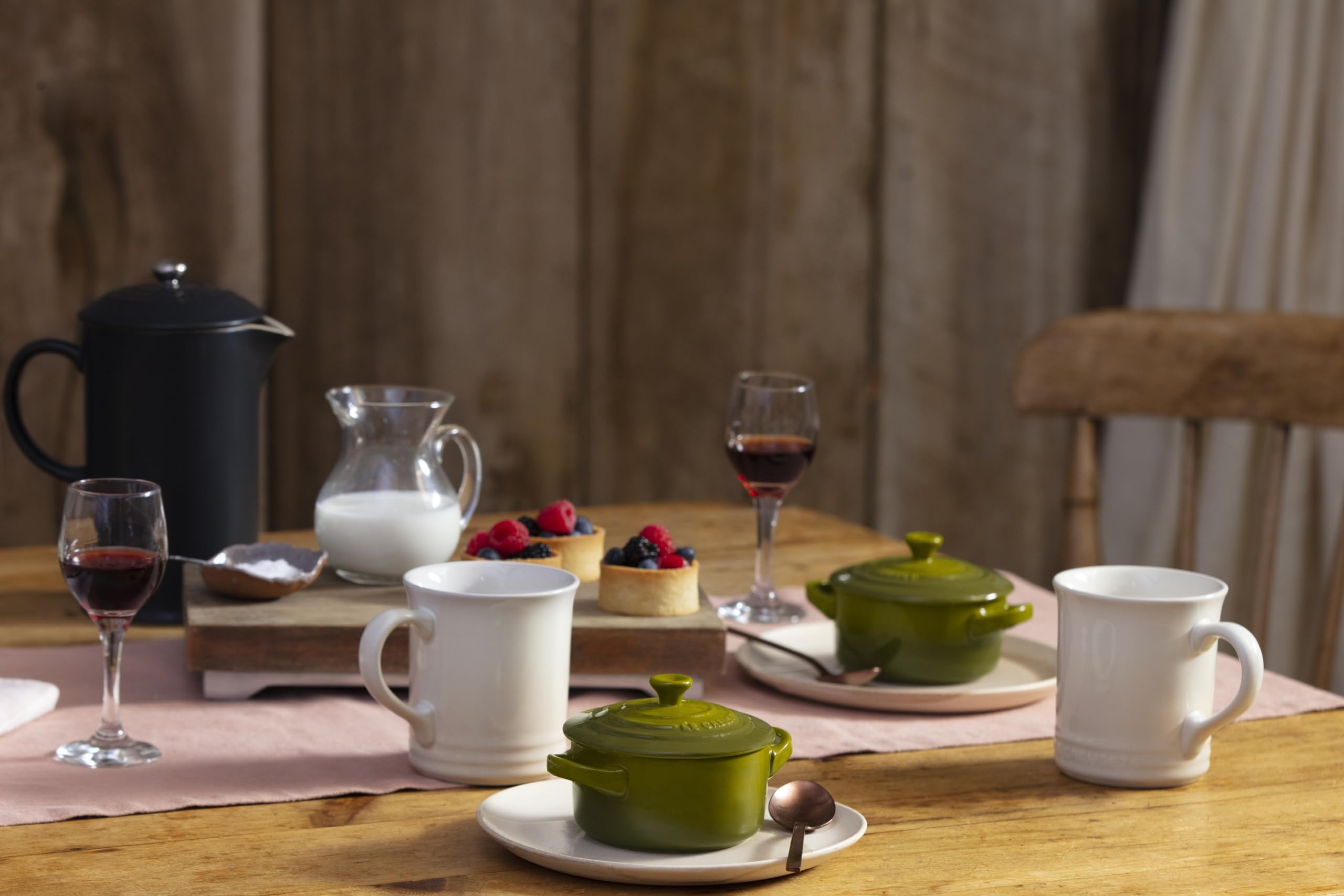Le Creuset Olive Mini Cocotte virtually nonstick glaze releases food.