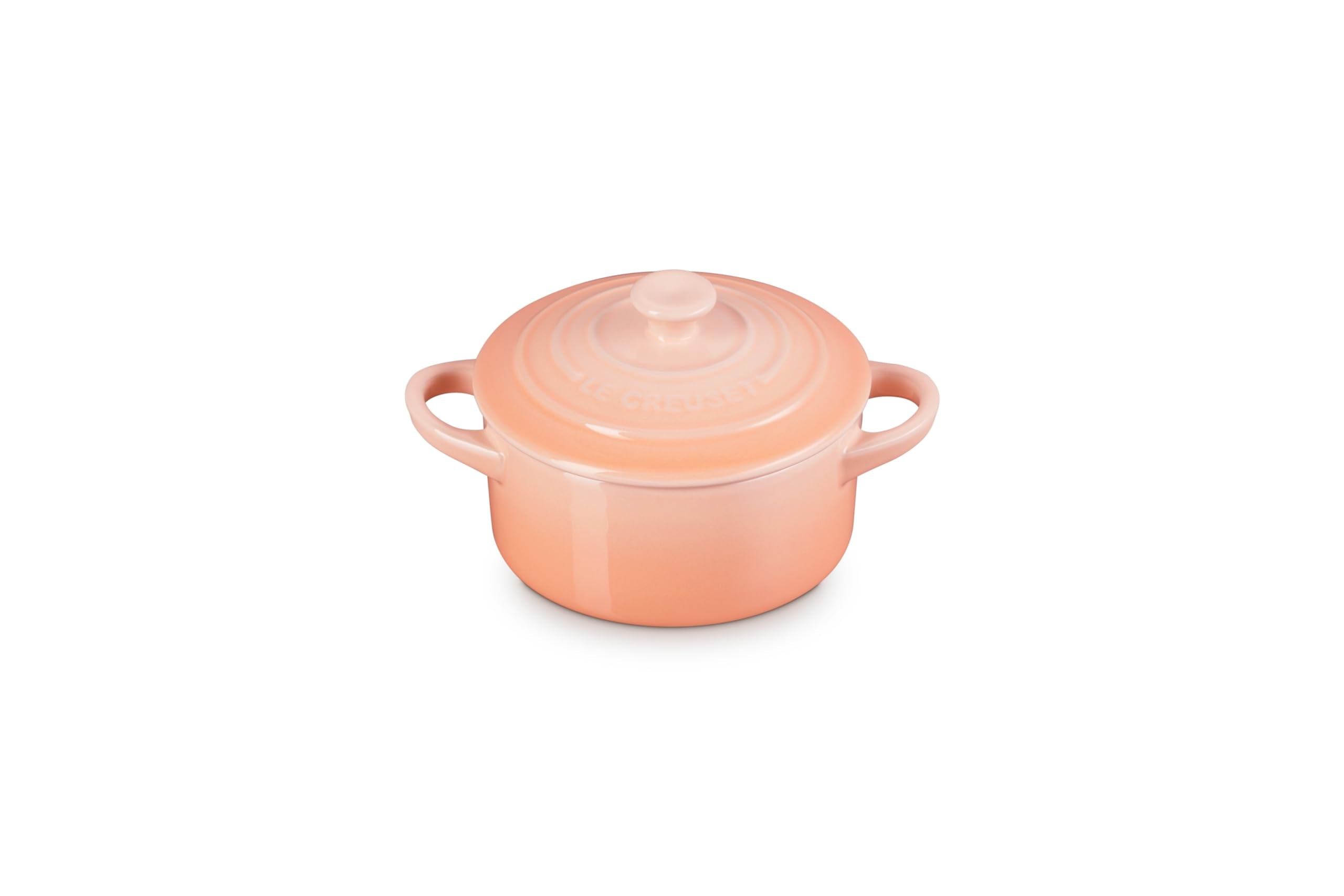 Le Creuset mini cocotte Peche with heart knob for sharing delightful desserts.