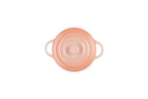 Le Creuset Peche cocotte in oven heat up to 400°F for versatile cooking.
