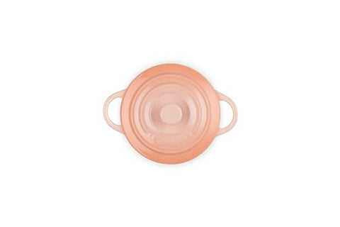 Le Creuset Peche cocotte in oven heat up to 400°F for versatile cooking.